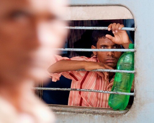 2. Waiting on a Train - Old Delhi, India - Copyright 2011 Ralph Velasco